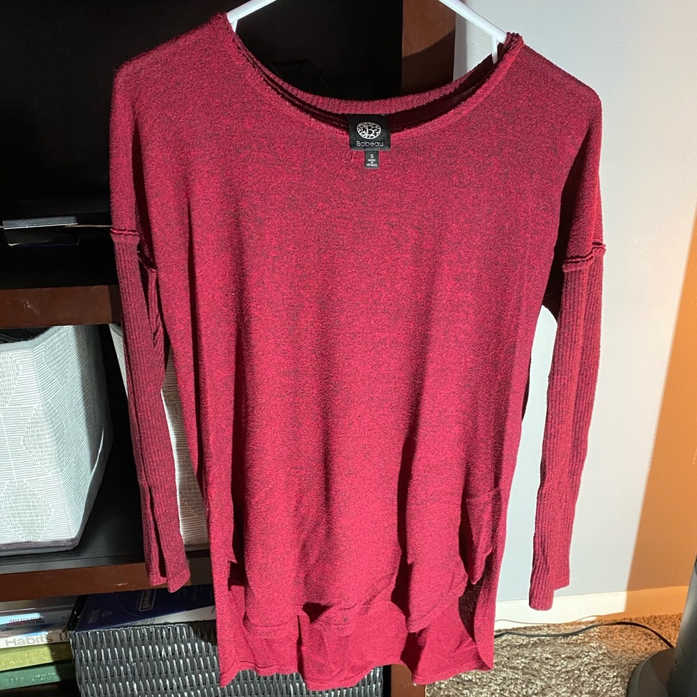 Super cute high/low top. Can dress up or down.